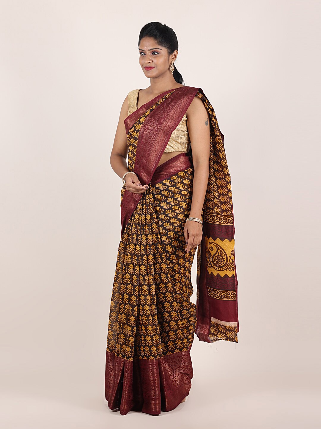 

Pothys Brown & Yellow Paisley Printed Zari Saree