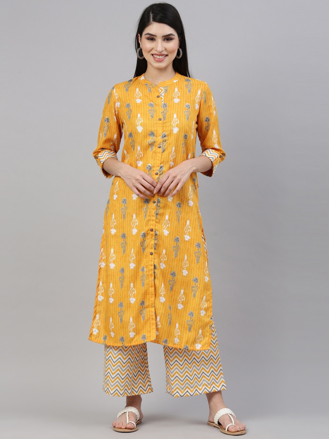 

Nahara Women Yellow Striped Panelled Kurti with Palazzos