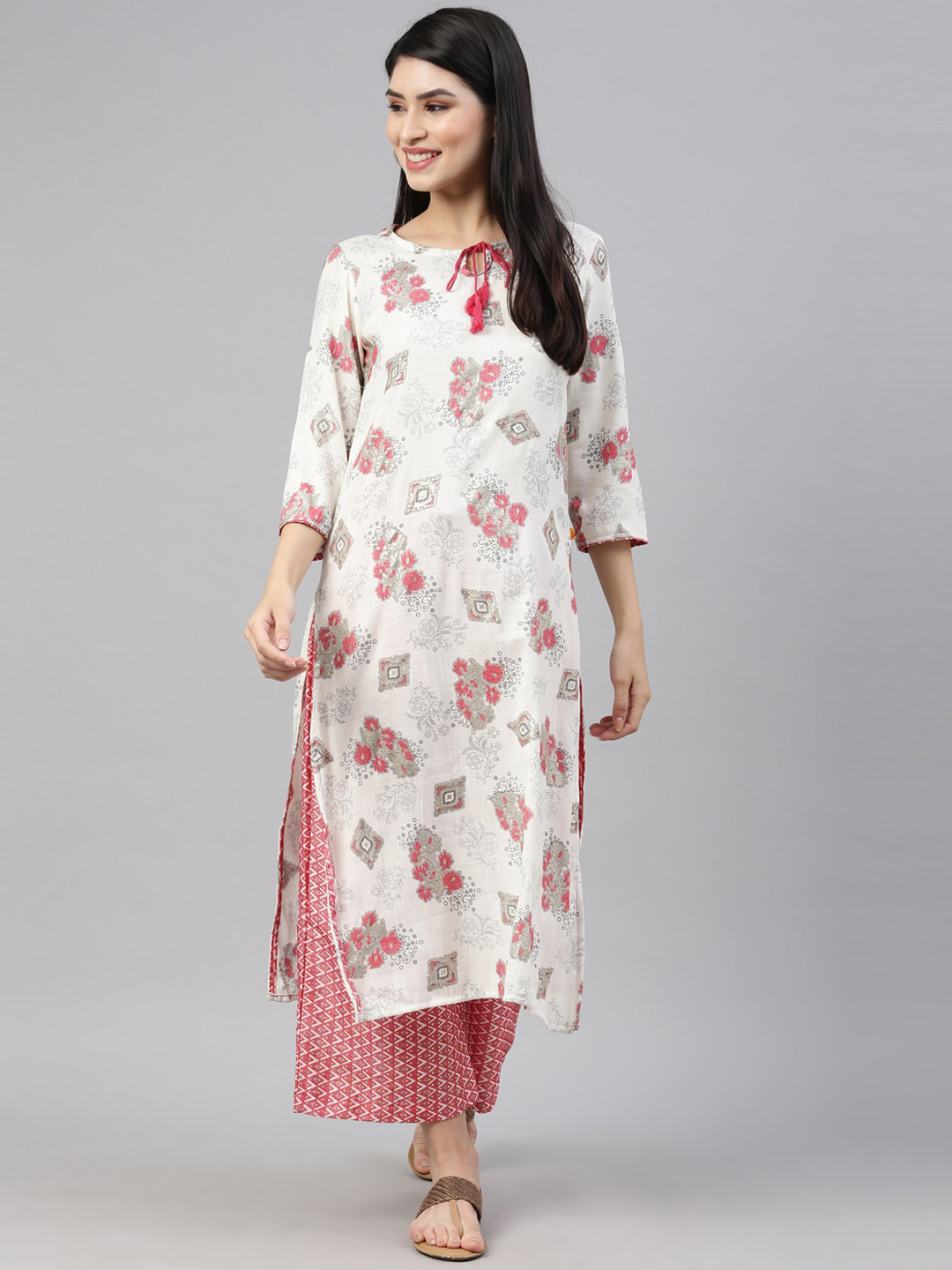 

Nahara Women White Floral Printed Kurti with Trousers