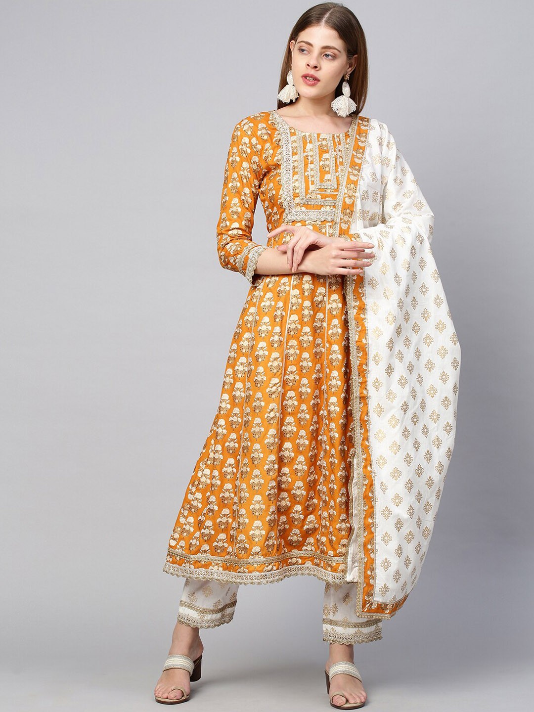 

FASHOR Women Yellow Floral Printed Panelled Pure Cotton Kurta with Trousers & With Dupatta
