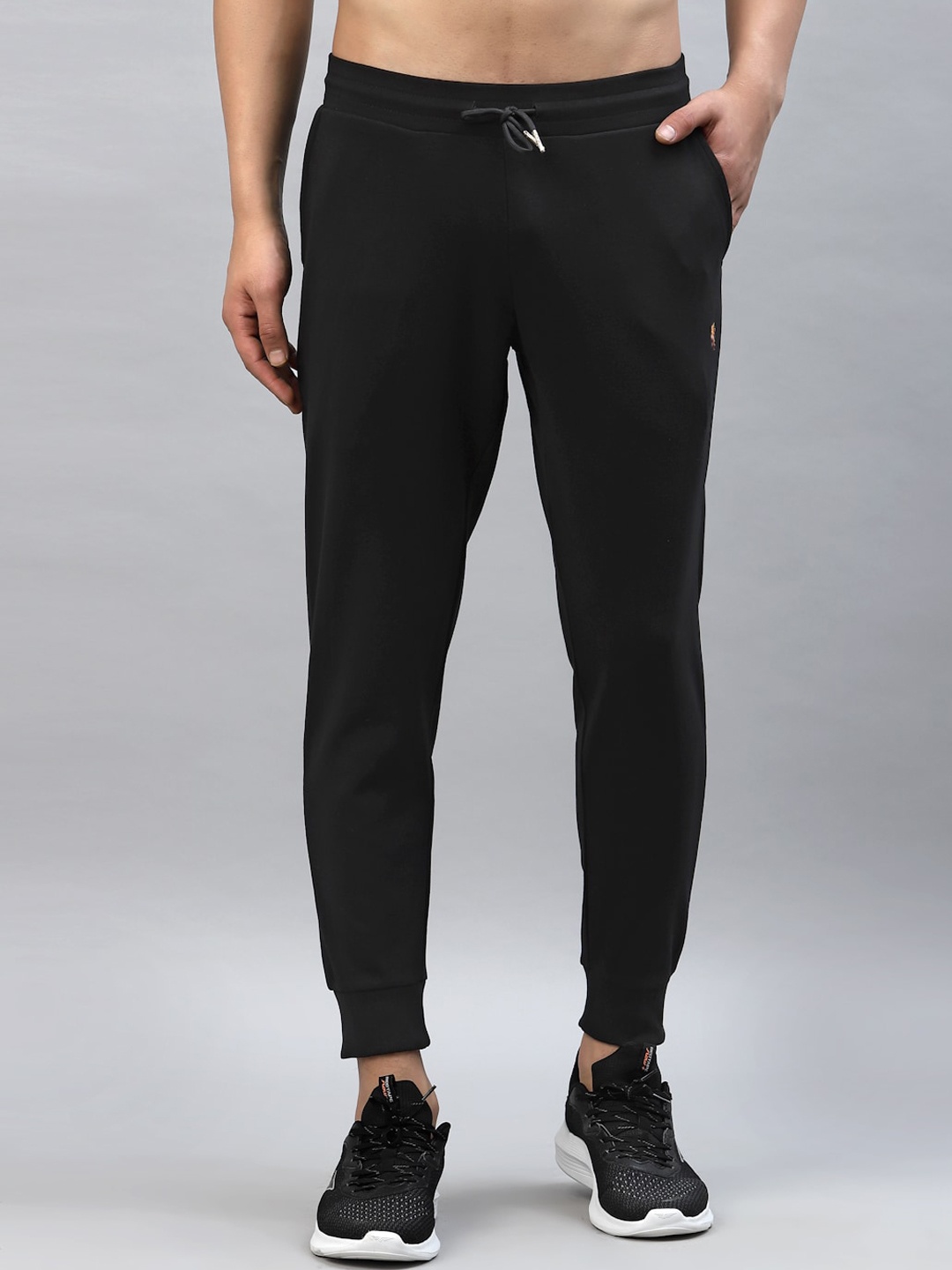 

Red Tape Men Black Solid Joggers