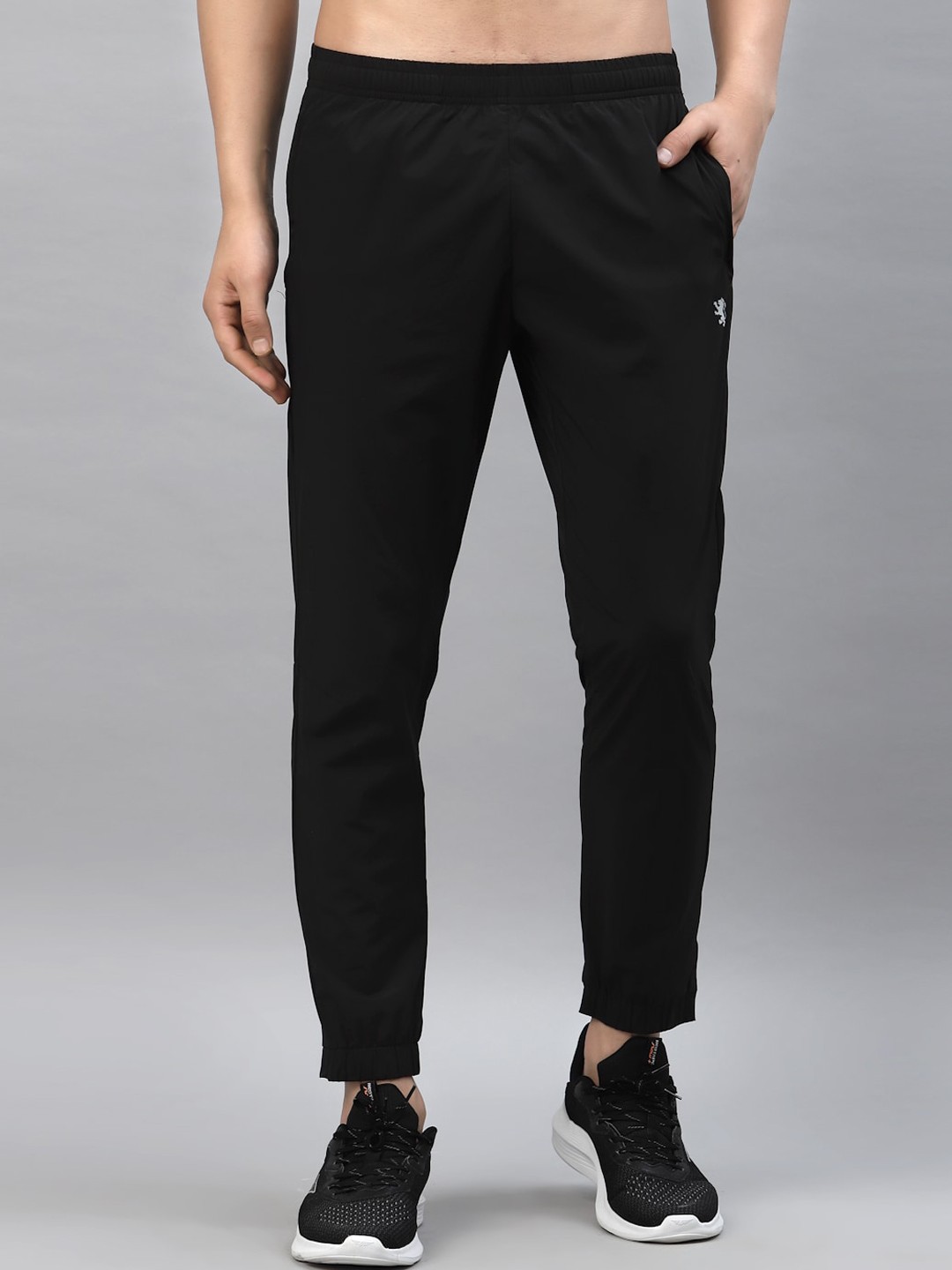 

Red Tape Men Black Solid Track pants
