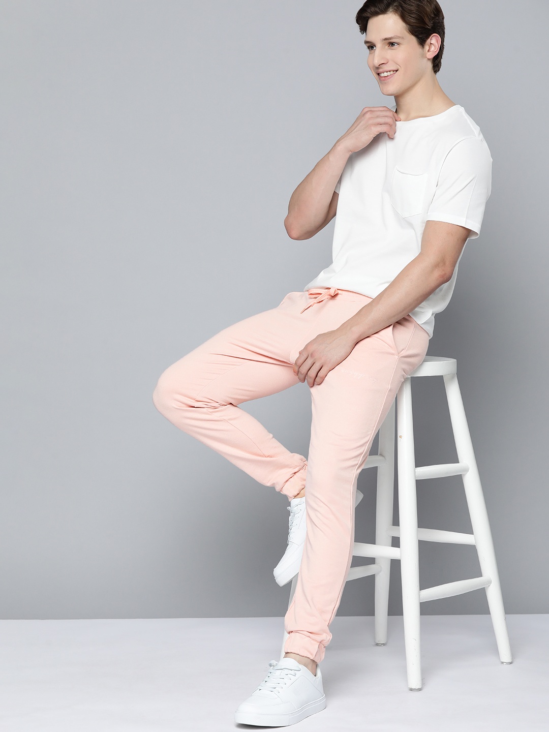 

Mast & Harbour Men Peach-Coloured Solid Regular Fit Joggers