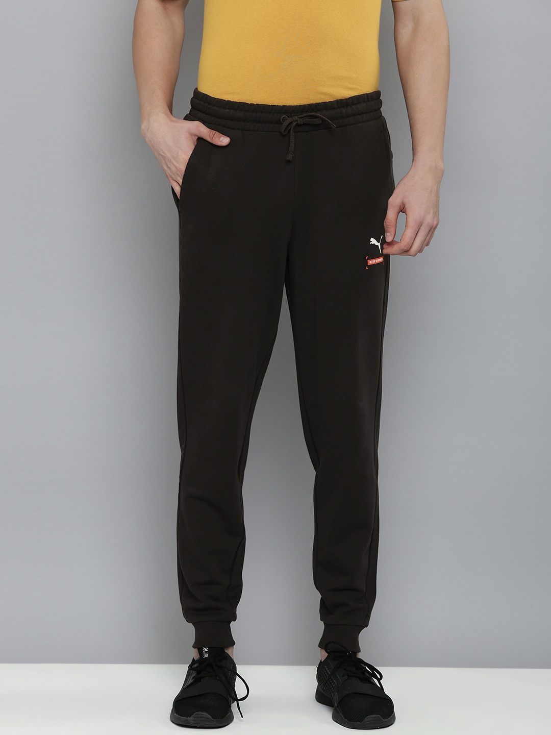 

Puma Men Black Solid Mid Rise Casual Joggers