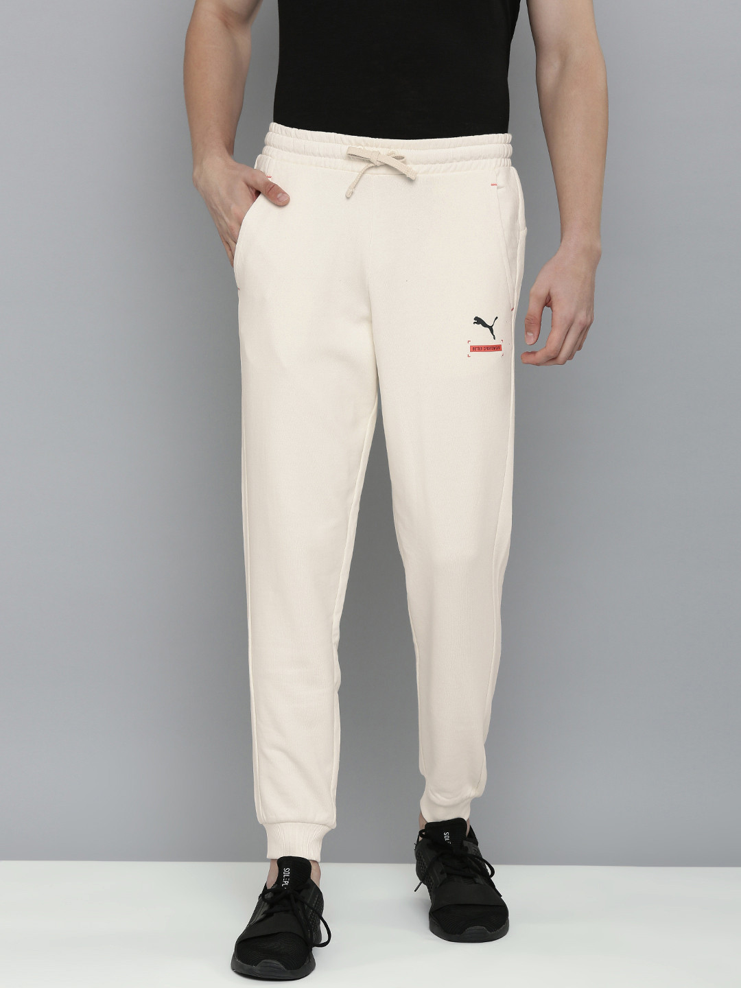 

Puma Men White Solid Mid Rise Casual Track Pants