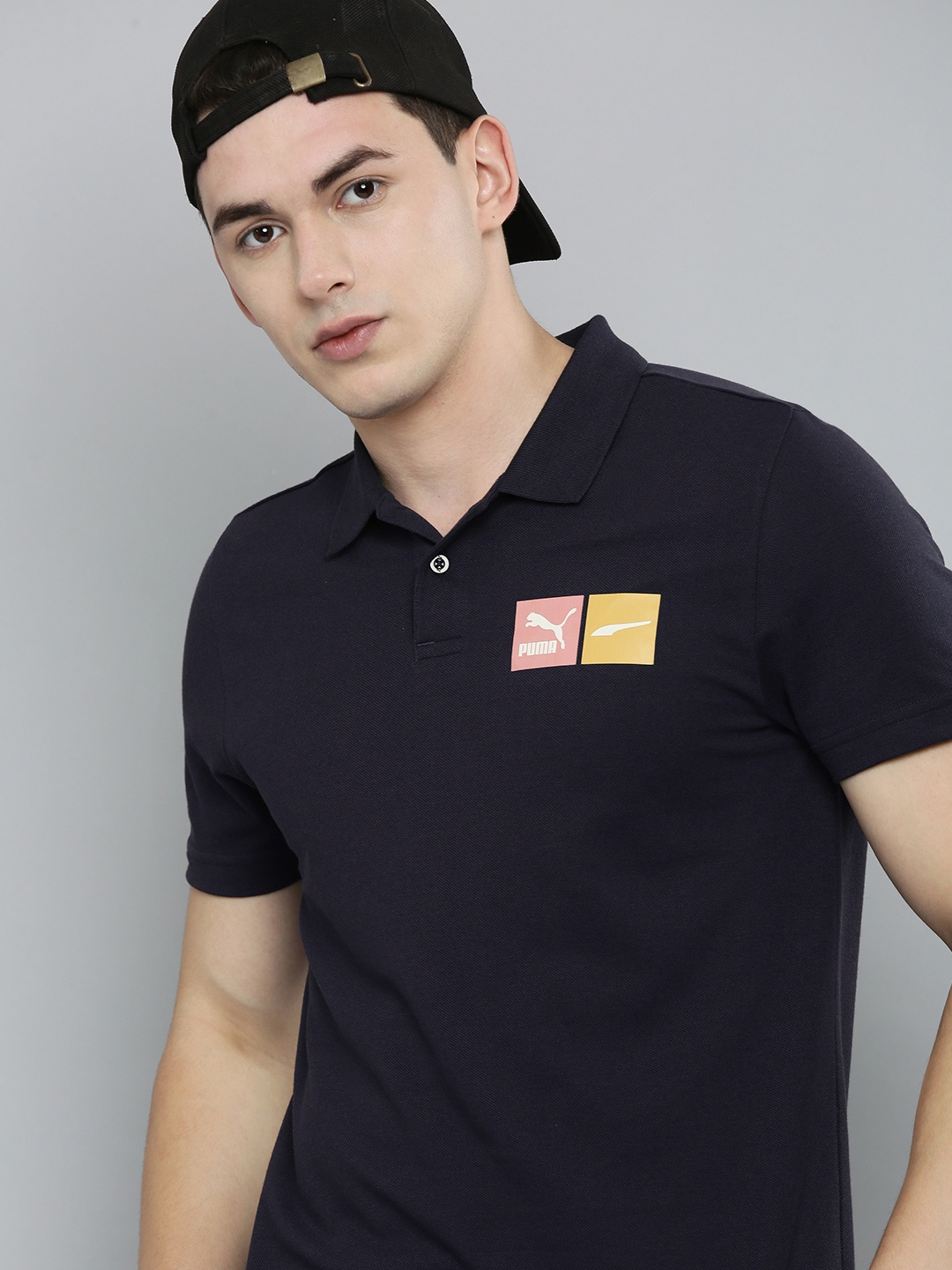 

Puma Men Navy Blue Brand Logo Printed Polo Collar T-shirt