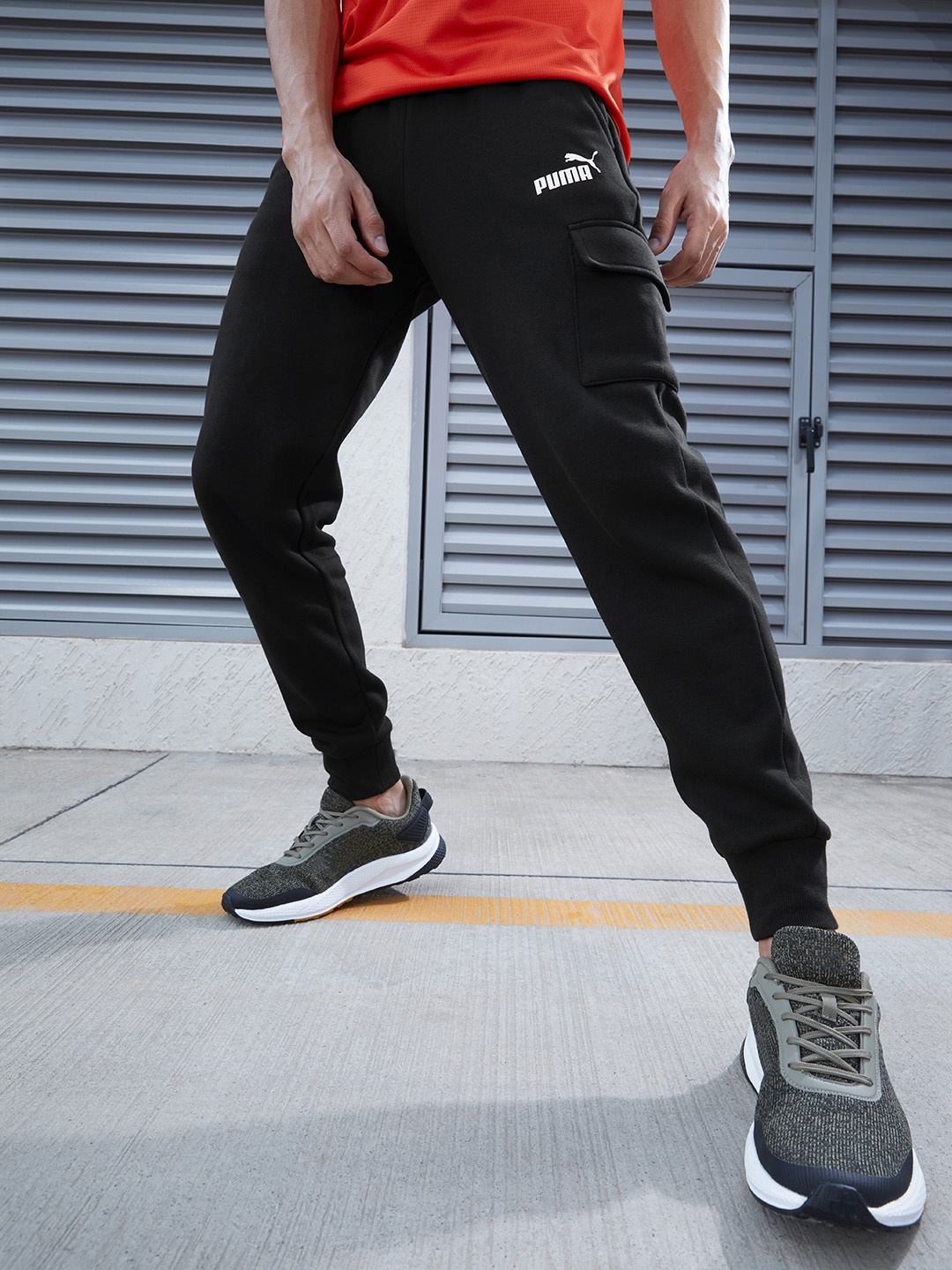 

Puma Men Black Regular Fit Solid Mid Rise Casual Joggers