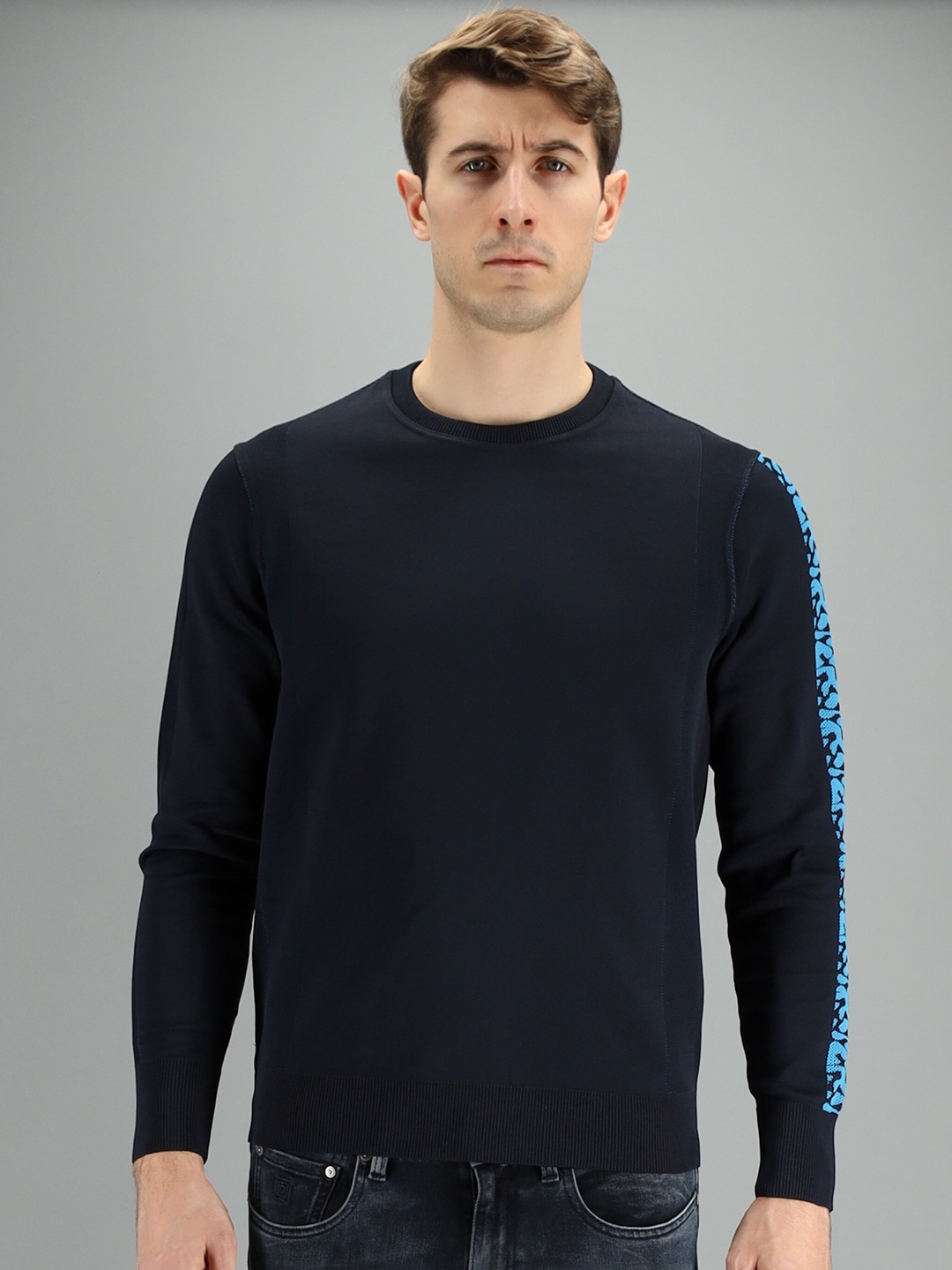 

FREESOUL Men Blue Solid Sweatshirt