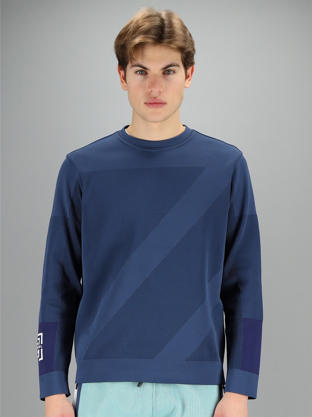 

FREESOUL Men Blue Colourblocked Sweatshirt