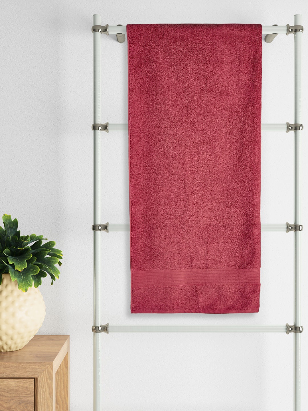 

Living scapes by Pantaloons Maroon Solid 550 GSM Pure Cotton Bath Towel