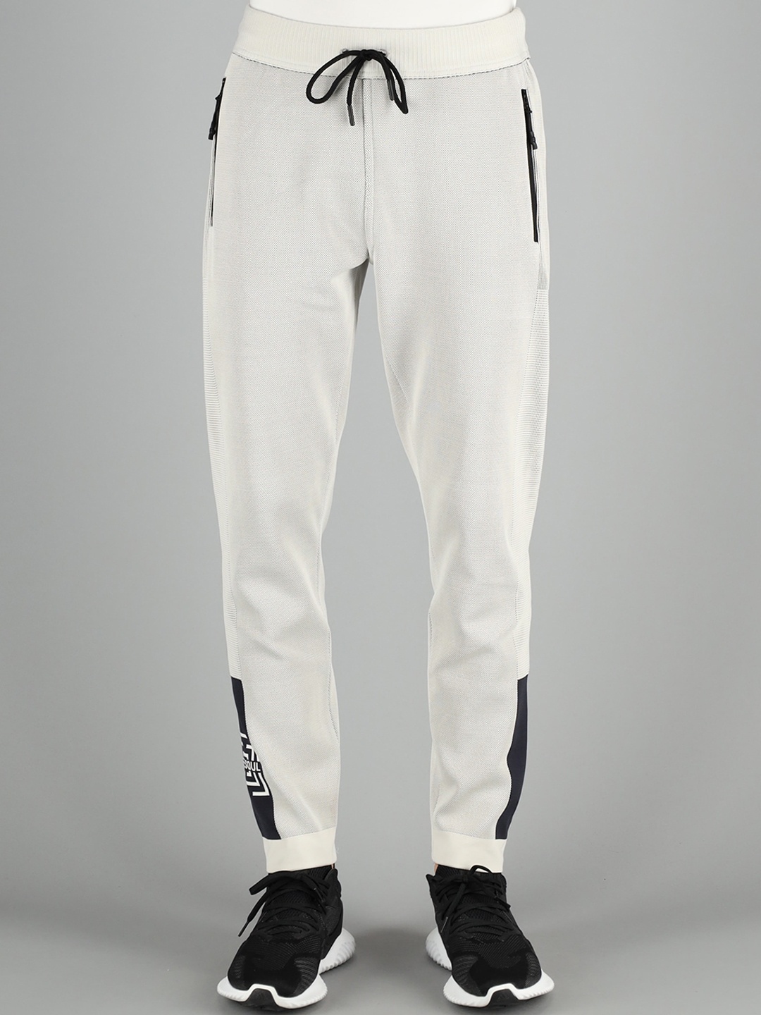 

FREESOUL Men Off White Solid Joggers