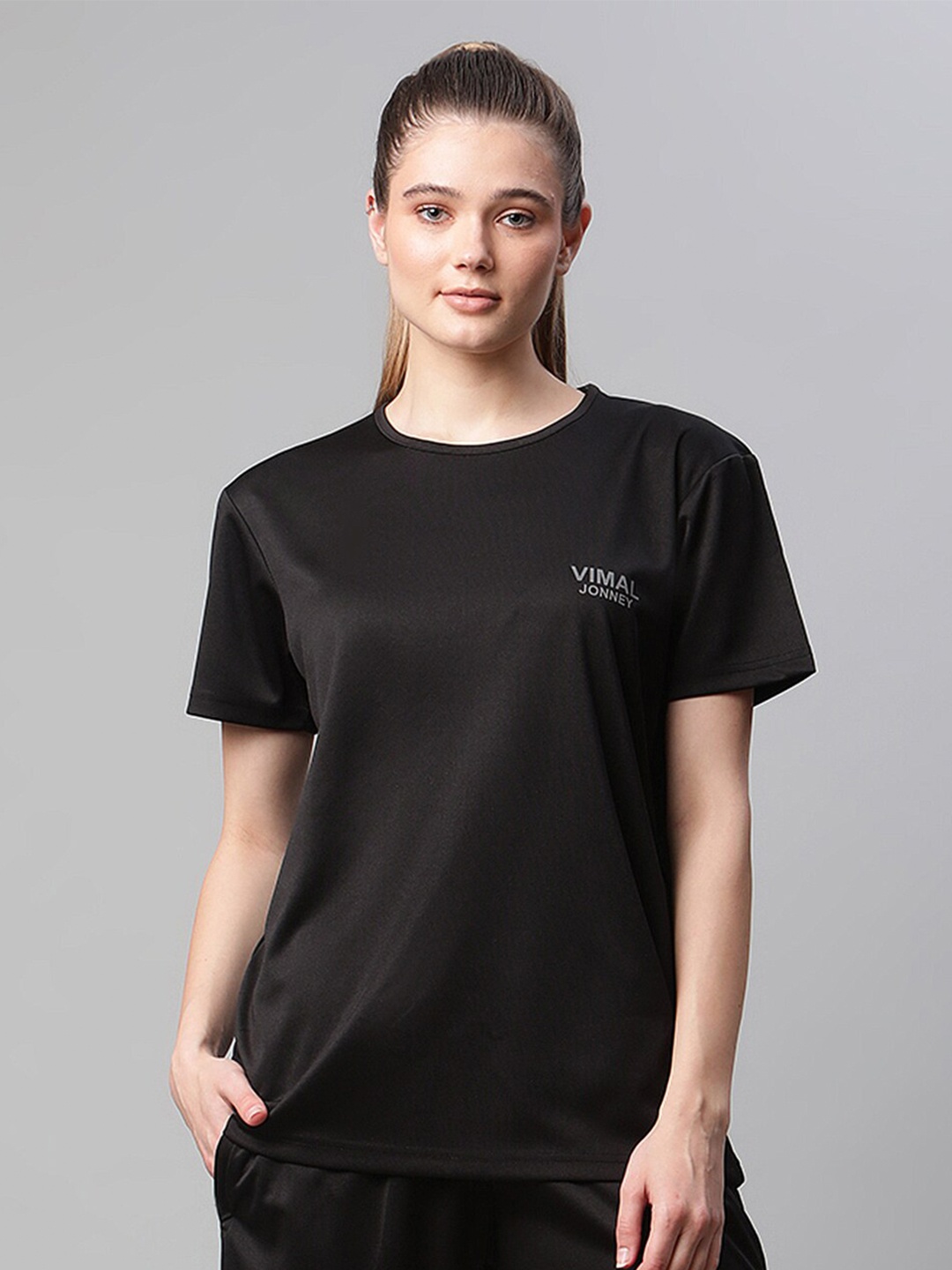 

MACK JONNEY JONNEY Women Black Solid Sports T-shirt