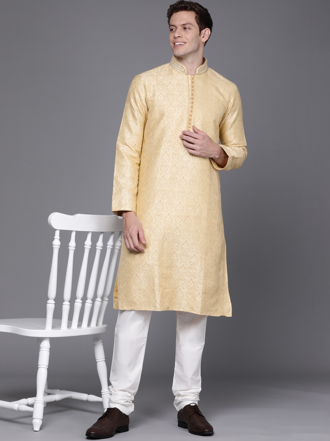 

Manu Men Beige Ethnic Motifs Kurta with Churidar