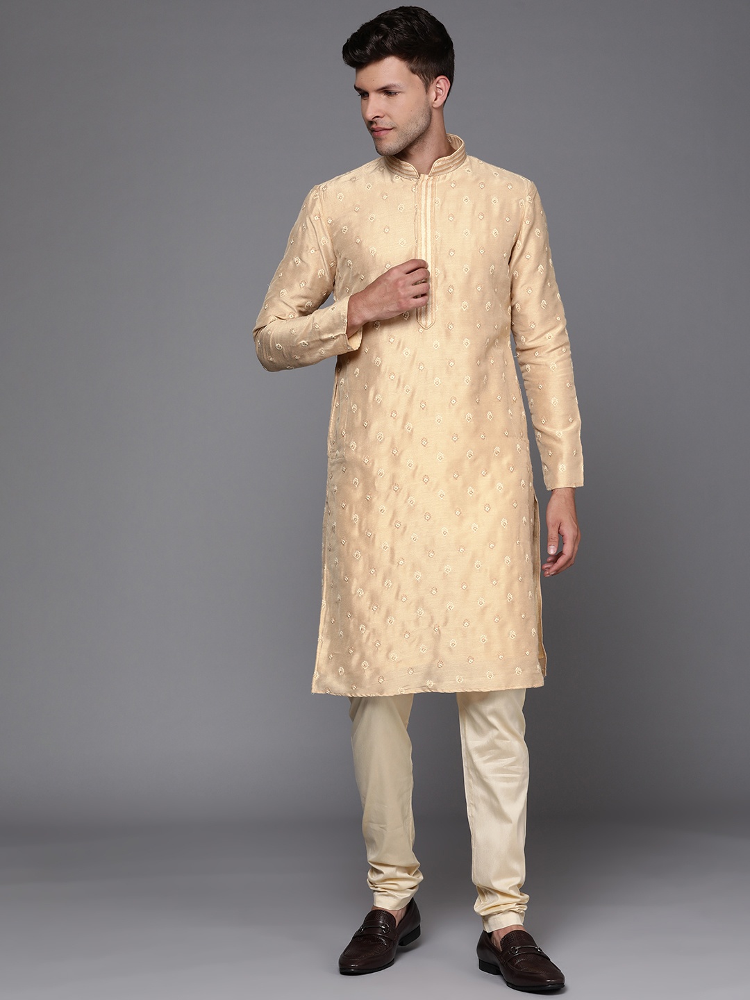 

Manu Men Beige Ethnic Motifs Embroidered Kurta with Churidar