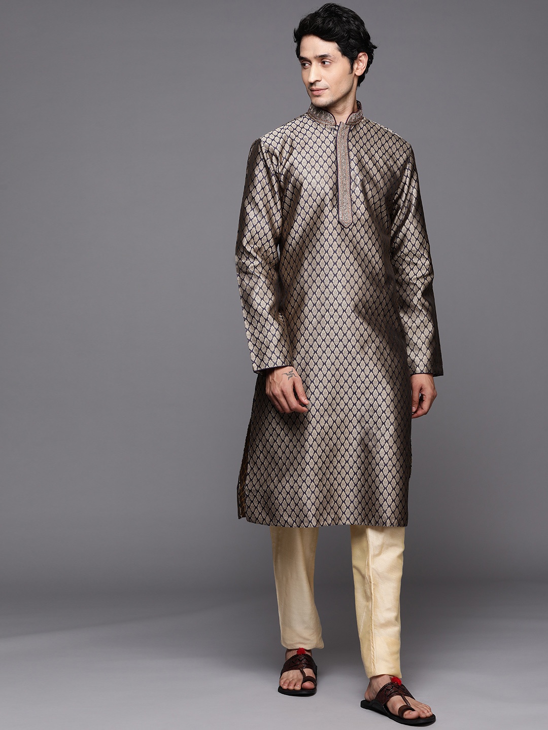 

Manu Men Navy Blue Ethnic Motifs Beads and Stones Kurta with Trousers