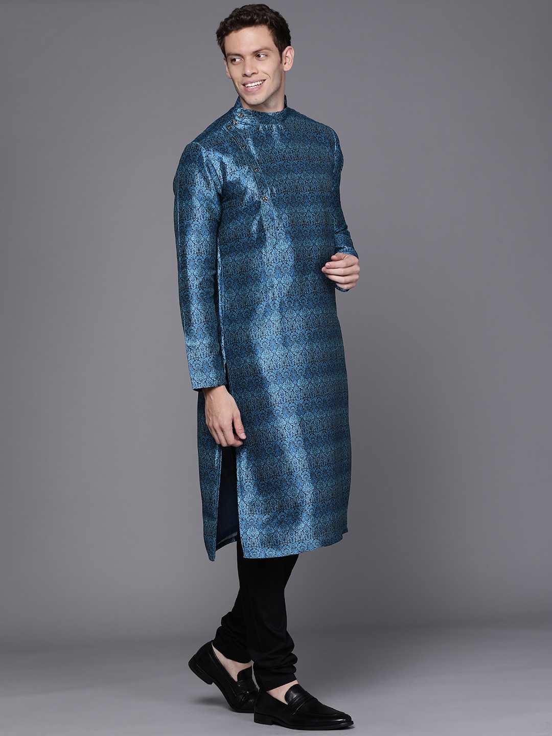 

Manu Men Blue & Black Ethnic Motifs Printed Kurta with Churidar