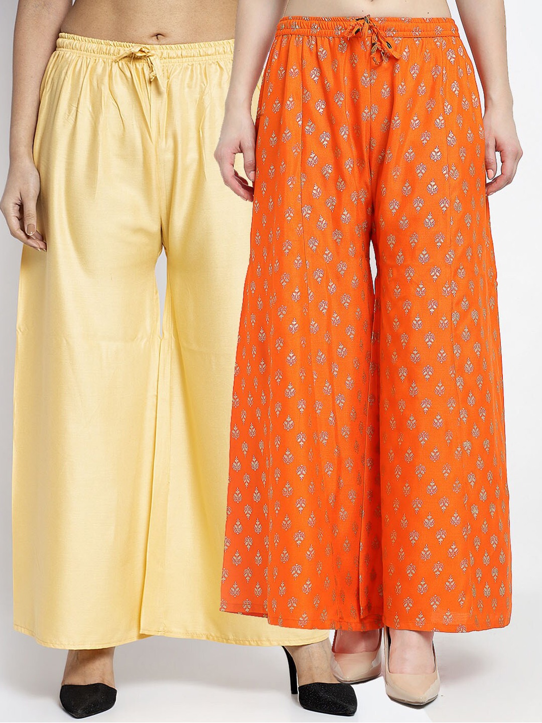 

Jinfo Women Beige & Orange 2 Ethnic Motifs Printed Flared Palazzos