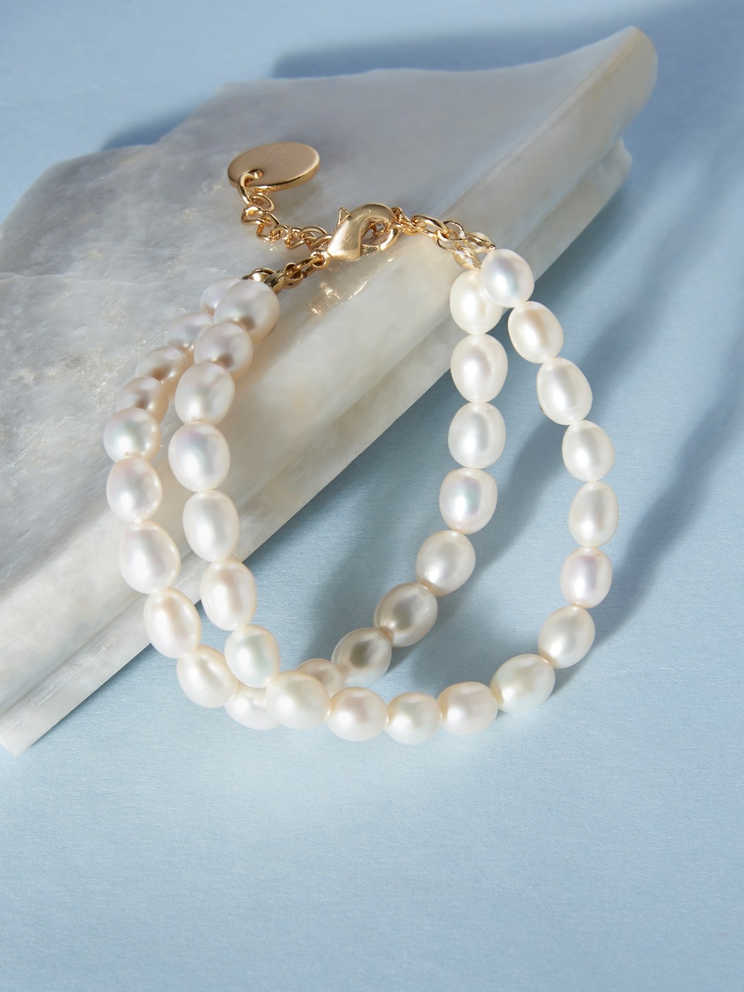 

Zaveri Pearls White Gold-Plated Freshwater Natural Rice AAA+ Dual Strand Bracelet