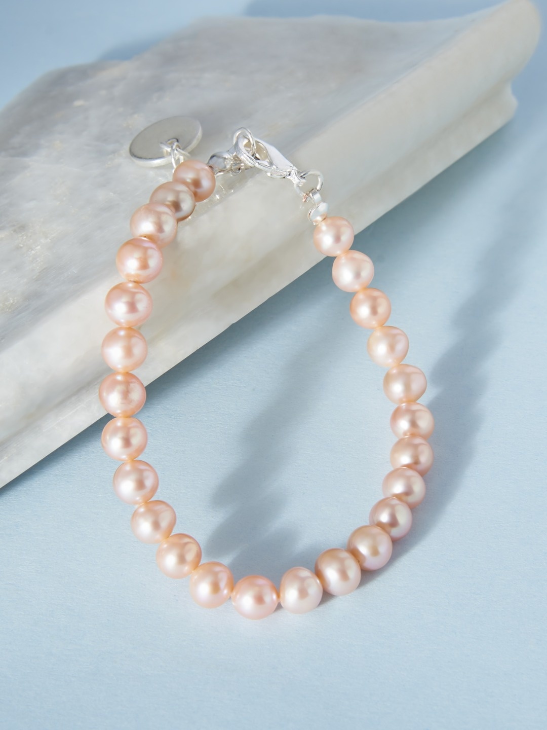 

Zaveri Pearls Peach & Silver-Plated Freshwater Natural AAA+ Single Strand Bracelet