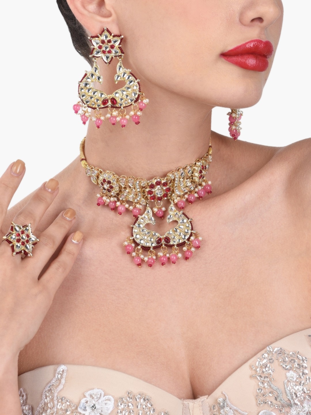 

Zaveri Pearls Gold-Plated & Pink Kundan-Studded & Pearls-Beaded Jewellery Set