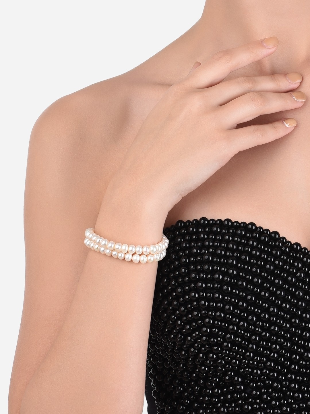 

Zaveri Pearls Gold-Plated & White Freshwater Natural Pearls Dual Strand Bracelet