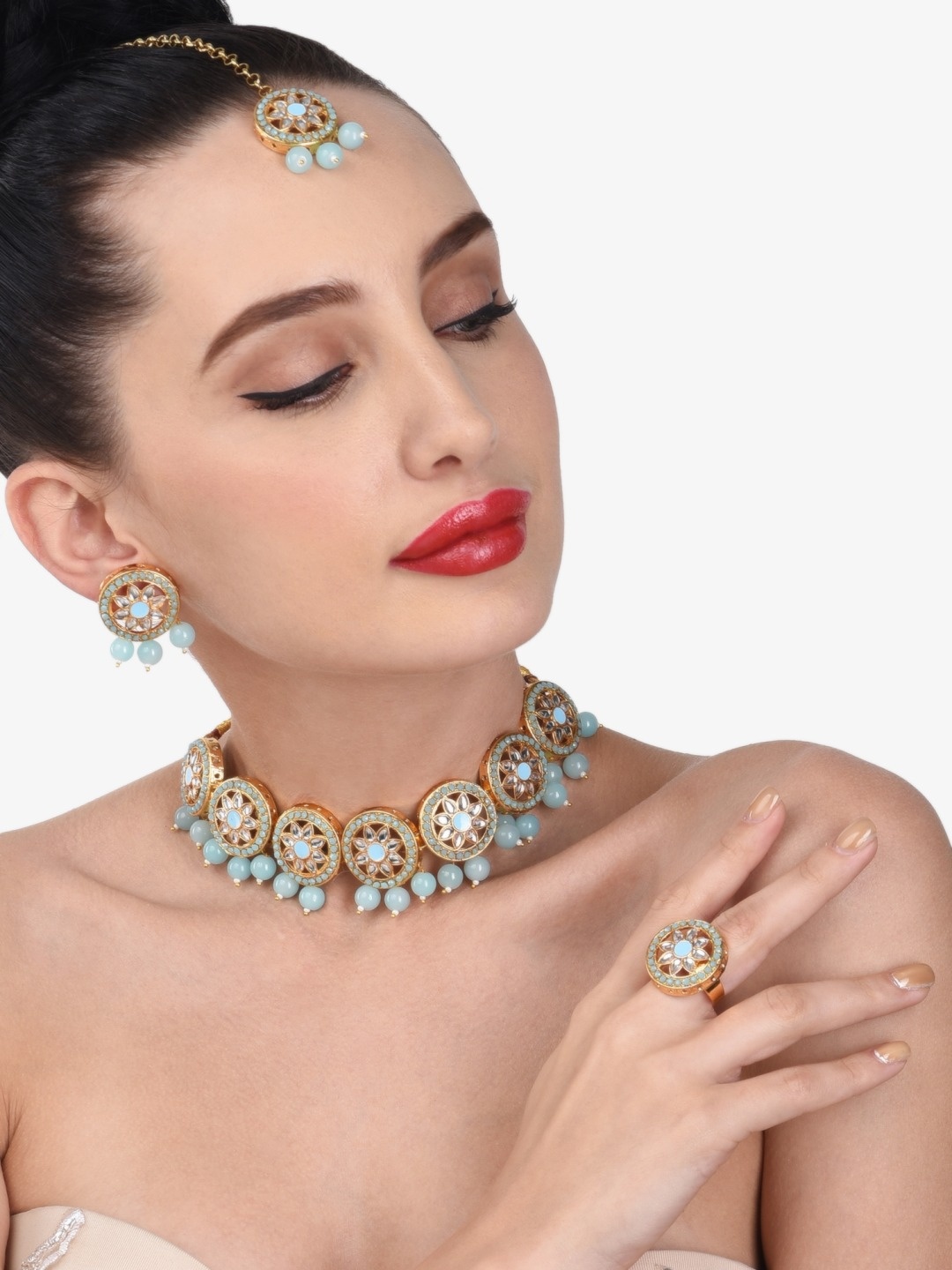 

Zaveri Pearls Gold-Plated Turquoise-Blue & White Stone-Studded & Beaded Jewellery Set