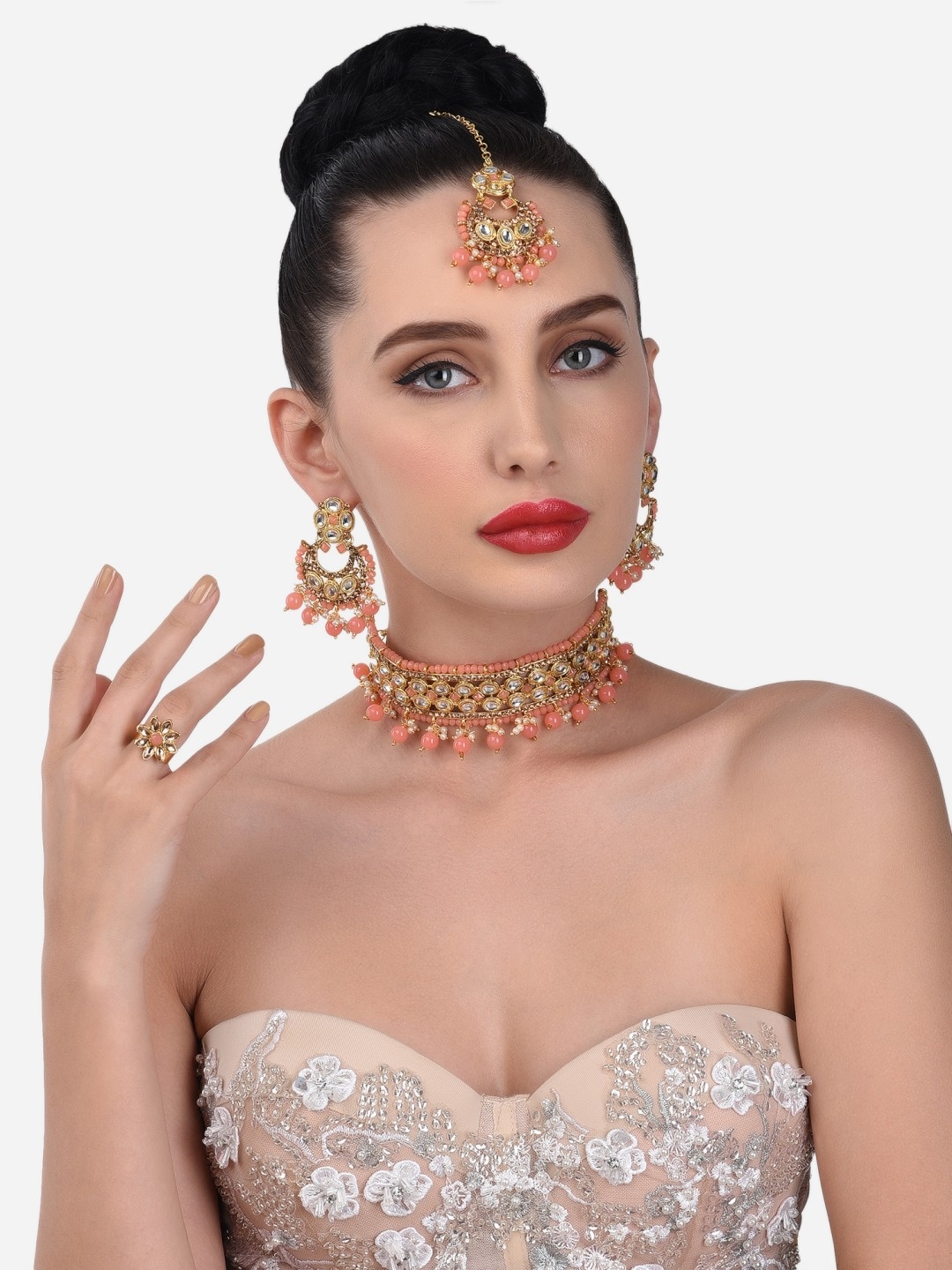 

Zaveri Pearls Gold-Plated Peach Stone Studded & Beaded Jewellery Set