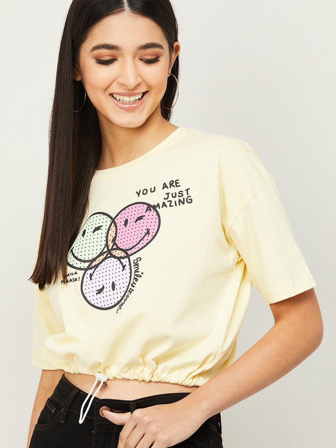

SmileyWorld Women Yellow Printed Cotton Crop Top