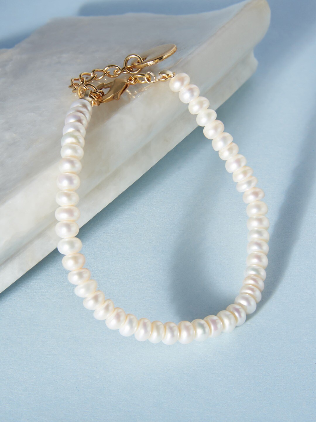 

Zaveri Pearls White Freshwater Natural AAA+ Button Single Strand Bracelet