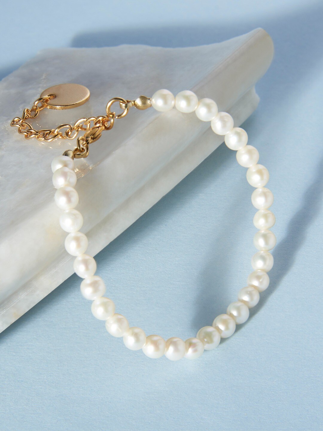 

Zaveri Pearls White & Gold-Plated Freshwater Natural 5-6 mm AAA+ Single Strand Bracelet