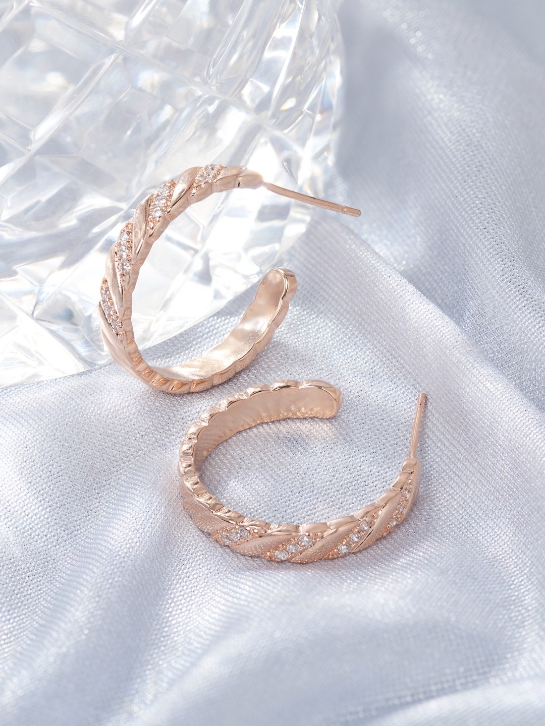 

AMI Rose Gold Plated Cubic Zirconia Studded Circular Half Hoop Earrings