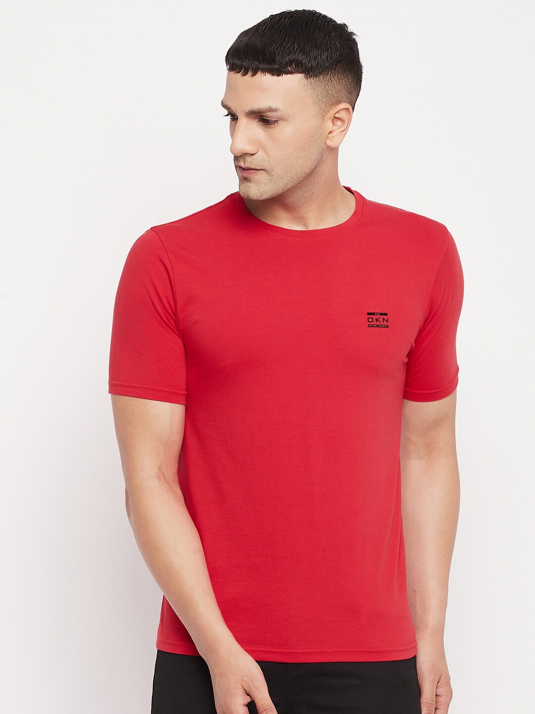 

Okane Men Red Solid T-shirt