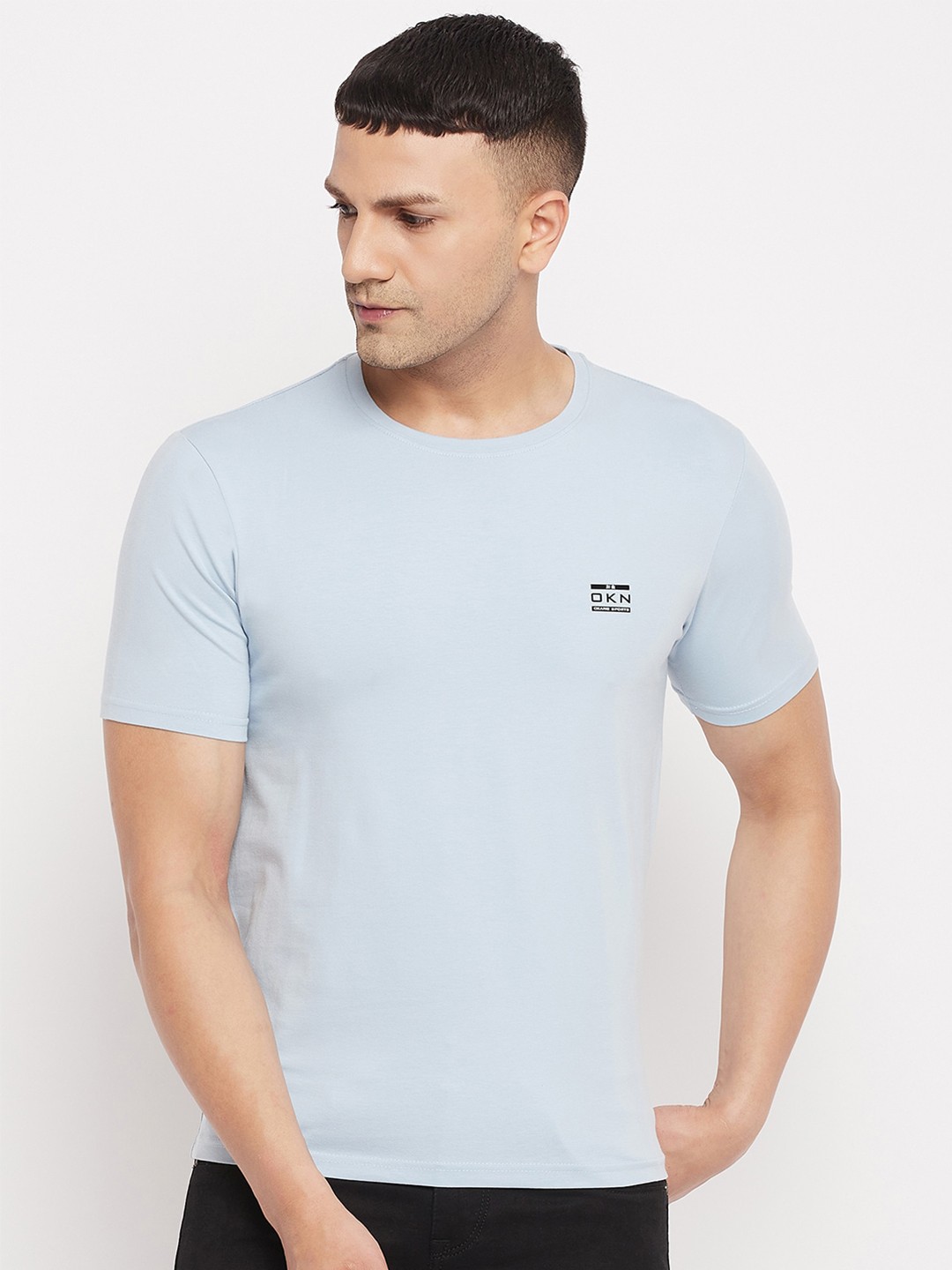 

Okane Men Blue Solid T-shirt