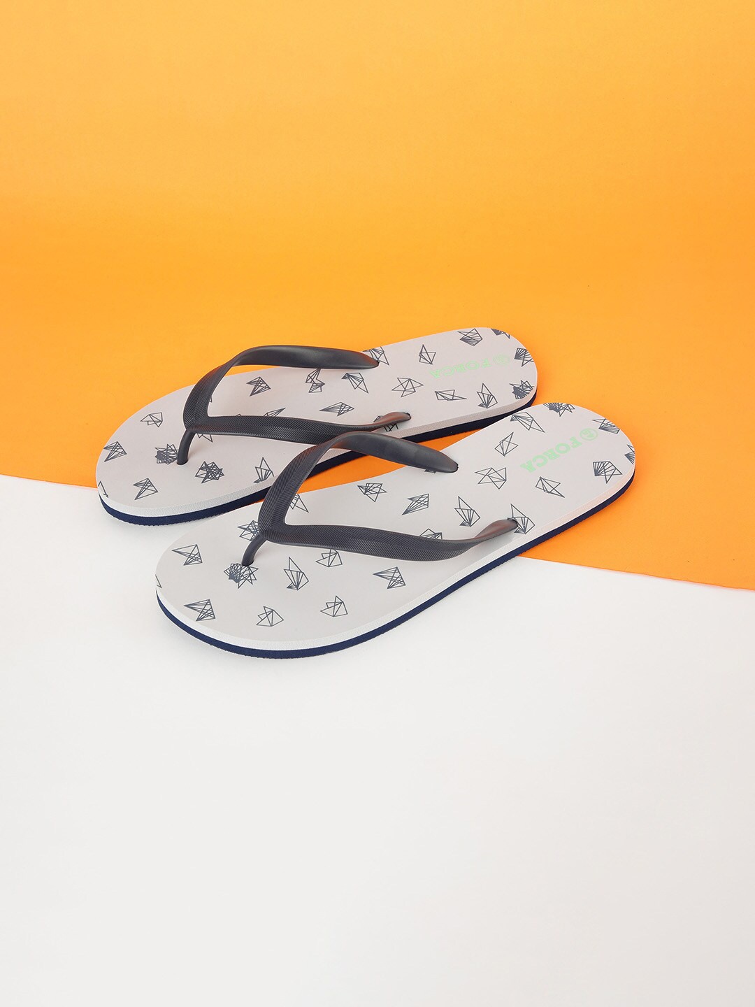 

Forca by Lifestyle Men White & Black Printed Rubber Thong Flip-Flops