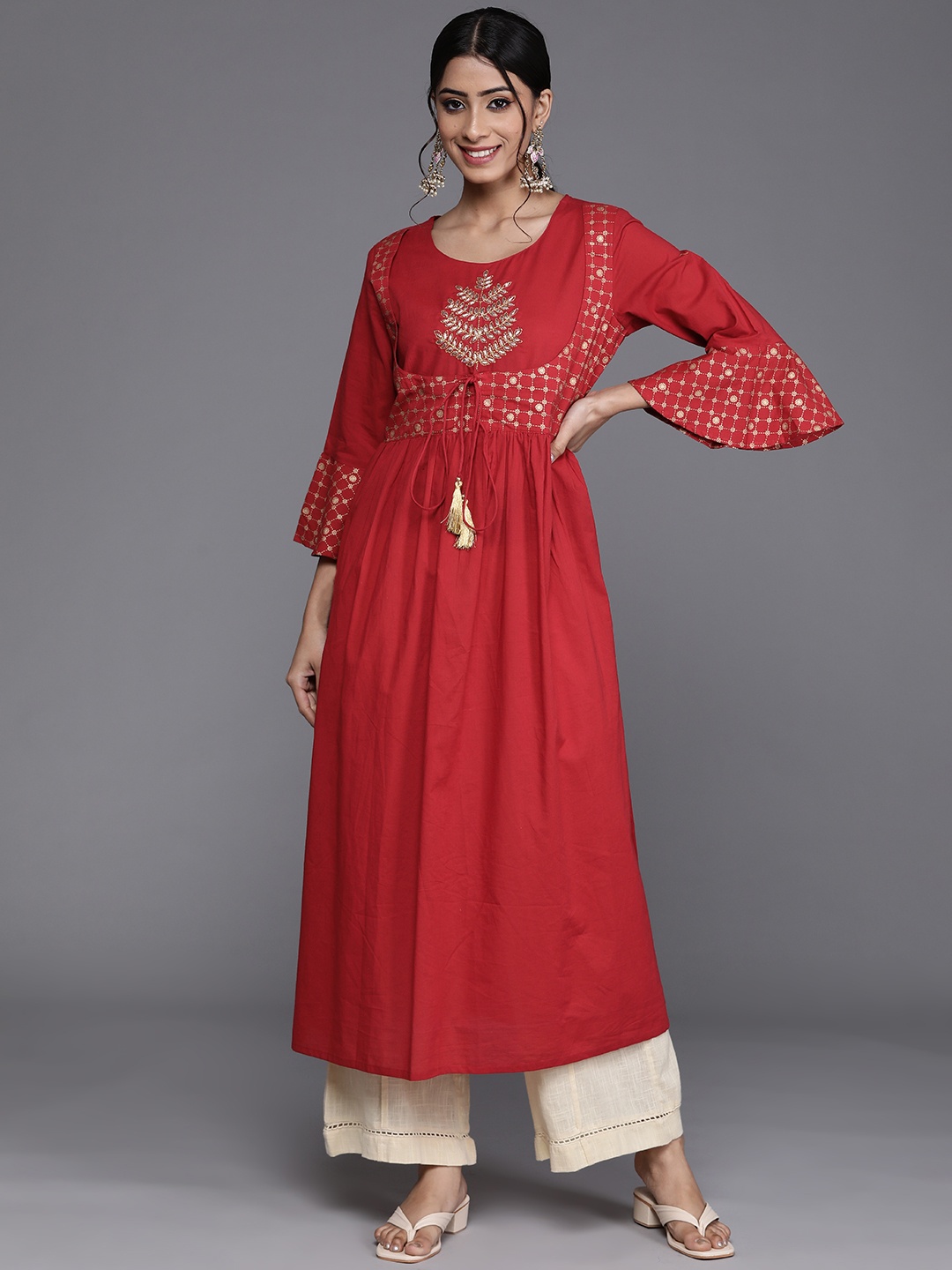 

Varanga Women Red & Golden Ethnic Motifs Embroidered Bell Sleeves Kurta