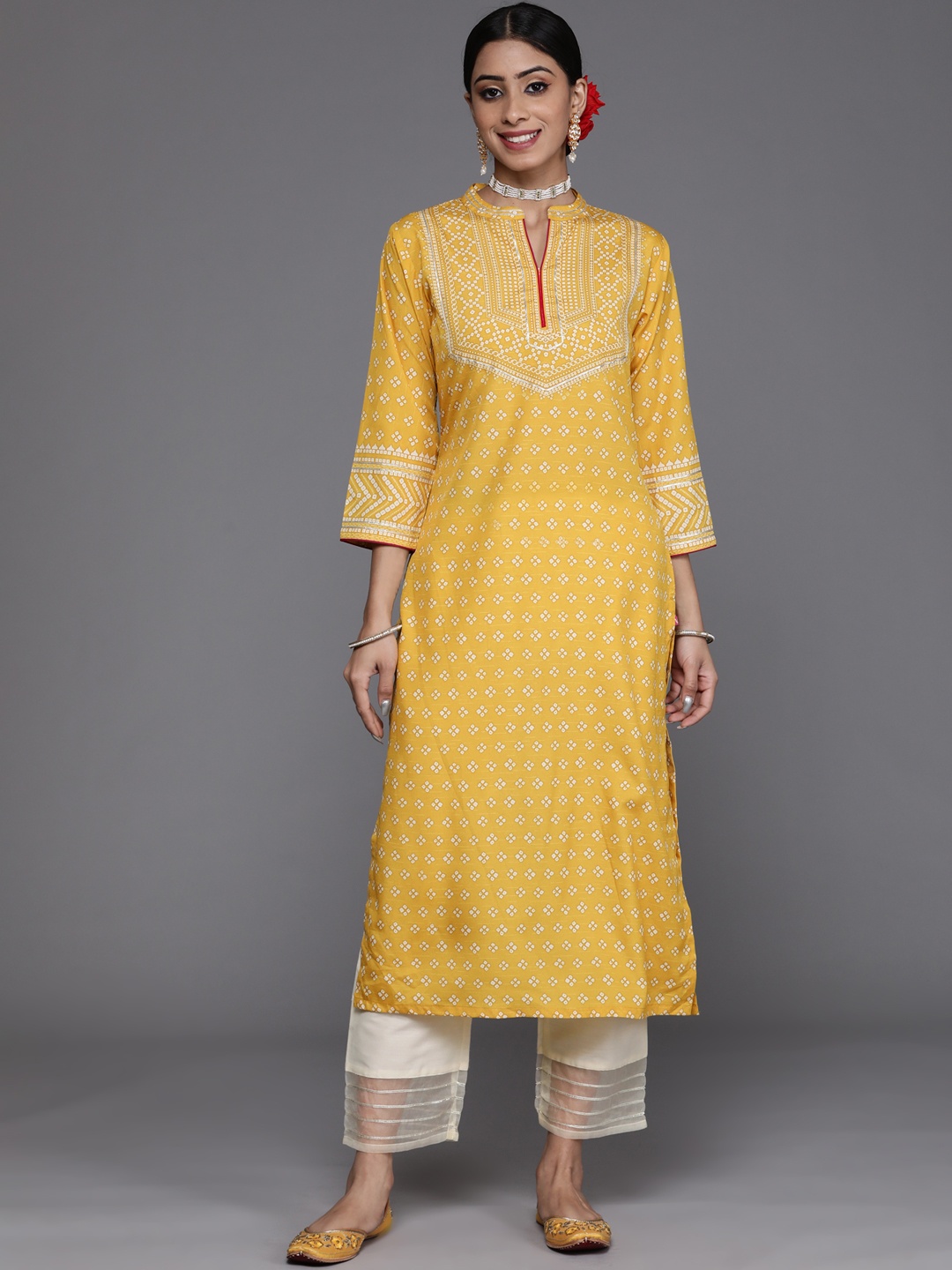 

Varanga Women Yellow & White Ethnic Motifs Printed Kurta with Trousers