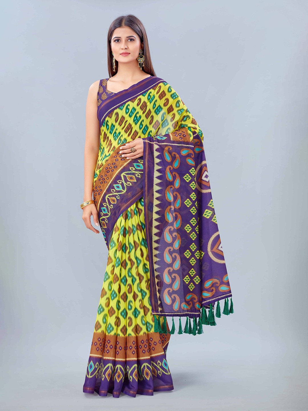 

Silk Land Yellow Purple Ethnic Motifs Saree With Tassels