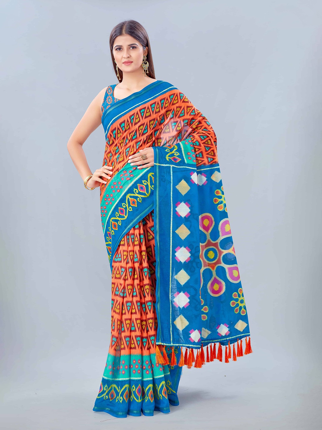 

Silk Land Orange White Saree With Tassels