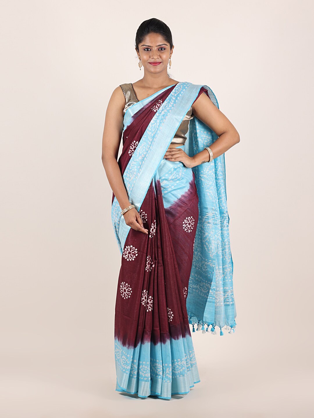 

Pothys Maroon & Blue Floral Pure Linen Saree