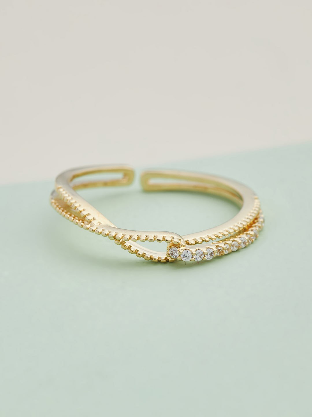 

Kushal's Fashion Jewellery Gold-Plated & White Cubic Zirconia Studded Finger Ring