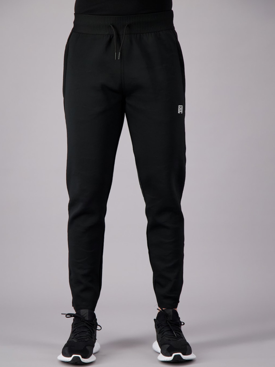 

FREESOUL Men Black Solid Track Pants