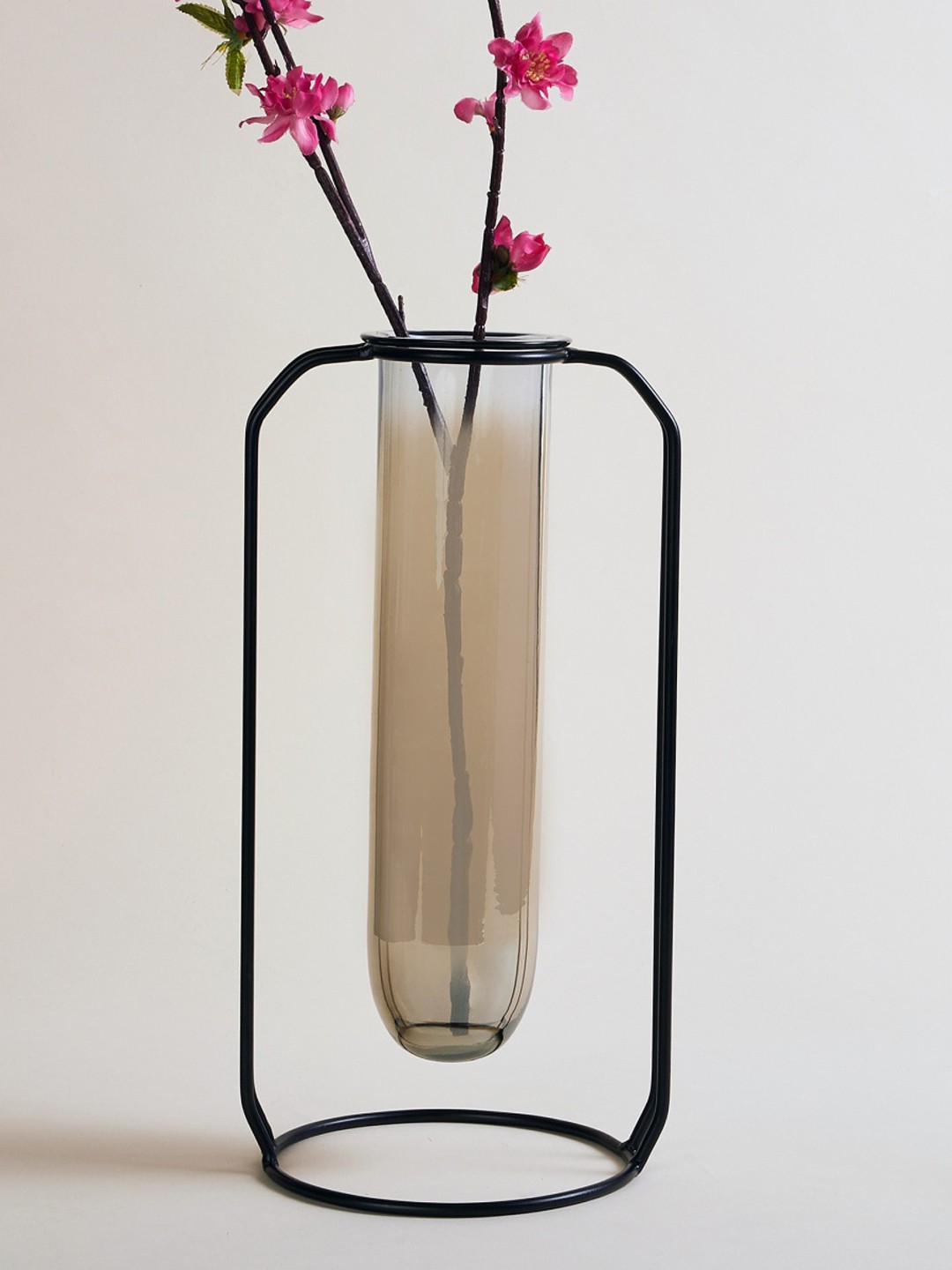 

Home Centre Black Solid Glass Tube Vase With Stand