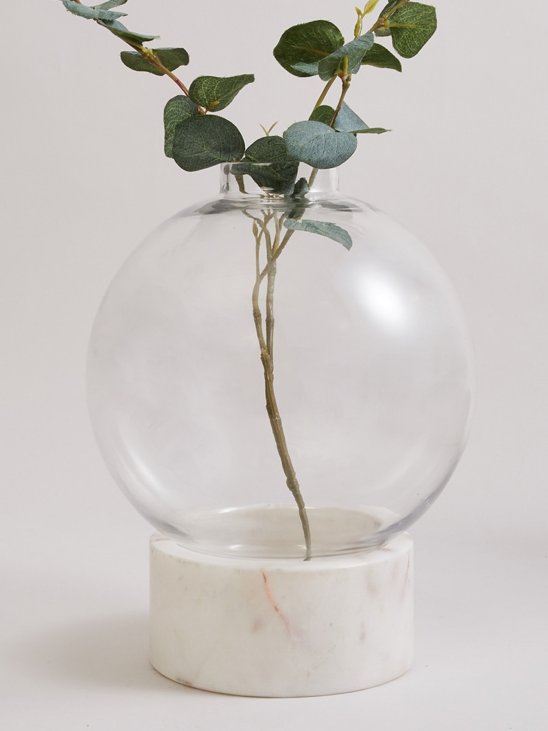 

Home Centre Beige Marble Base Transparent Glass Vase