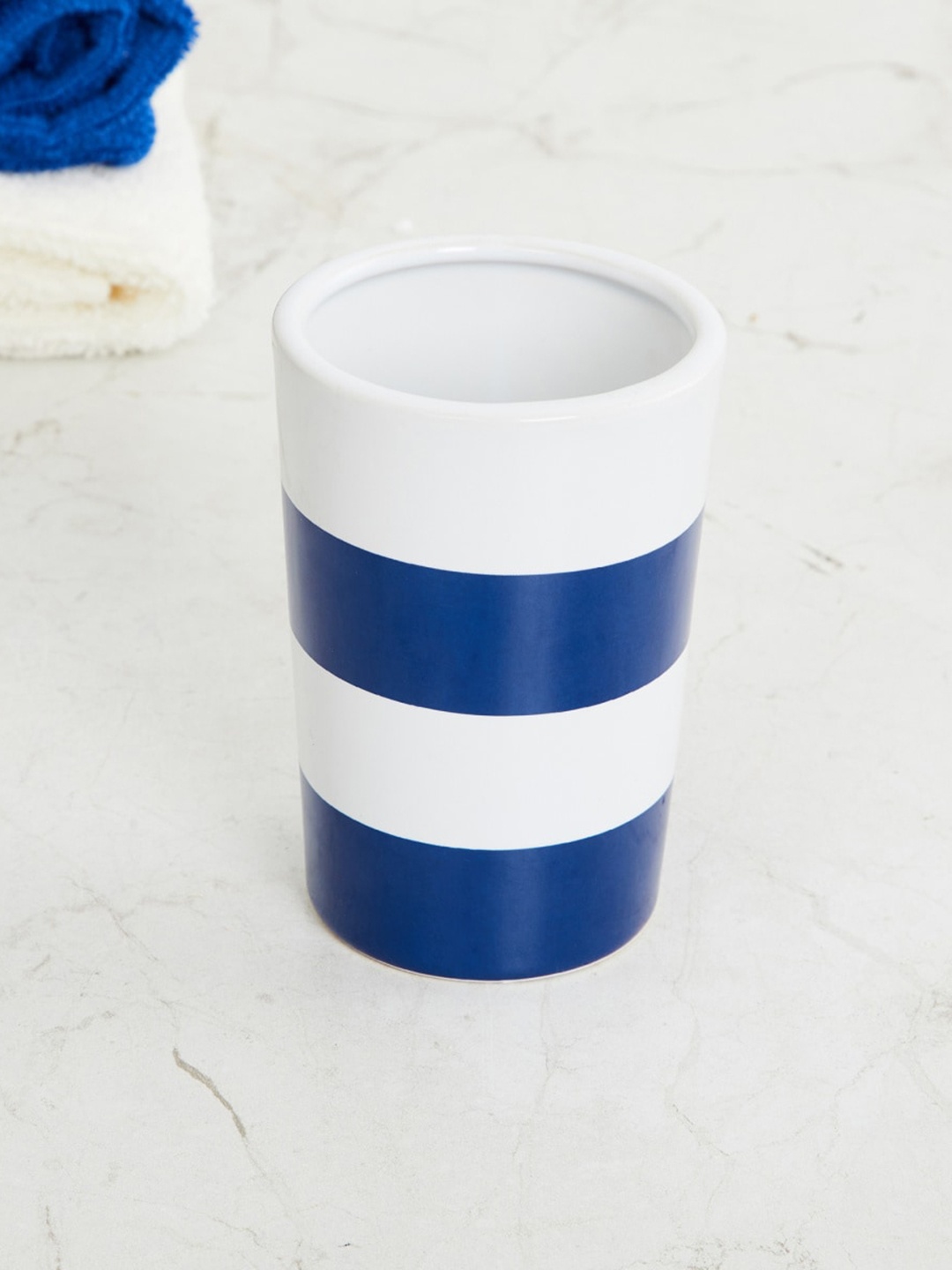 

Home Centre Blue & White Colourblocked Ceramic Tumbler