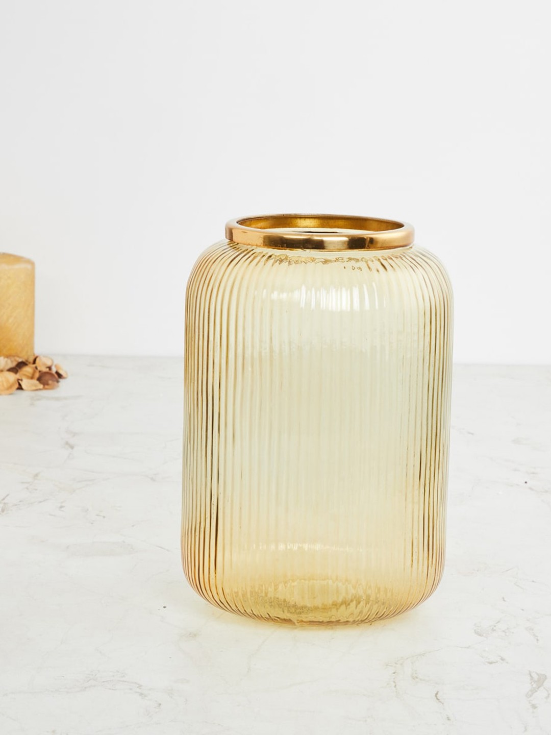 

Home Centre Gold-Toned Textured Glass Candle Holder
