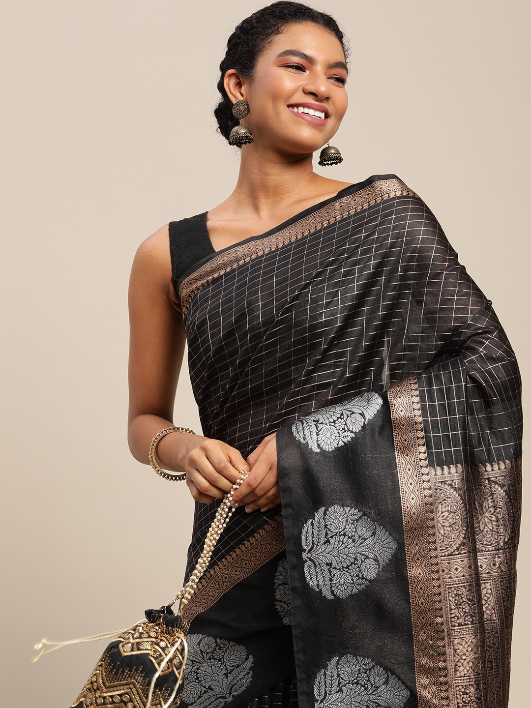 

Royal Rajgharana Saree Black & Golden Checked Banarasi Sarees