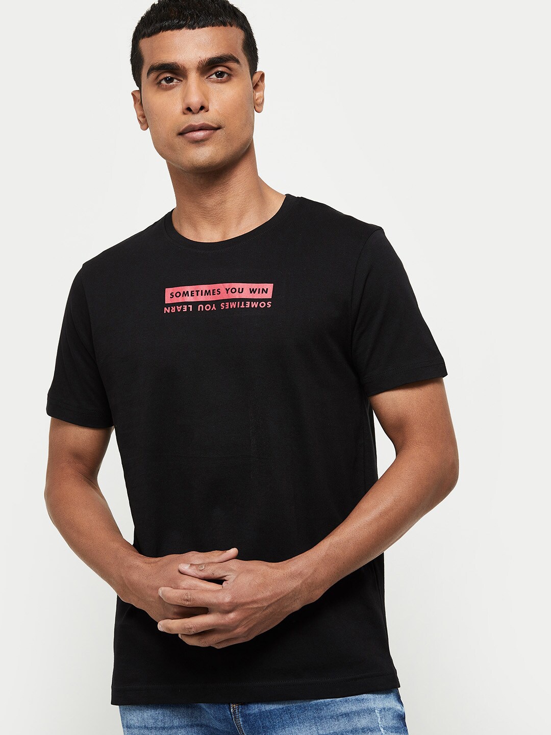 

max Men Black Solid Cotton T-shirt