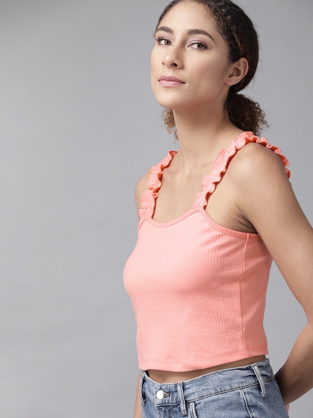 

Roadster Women Peach-Coloured Solid Crop Top