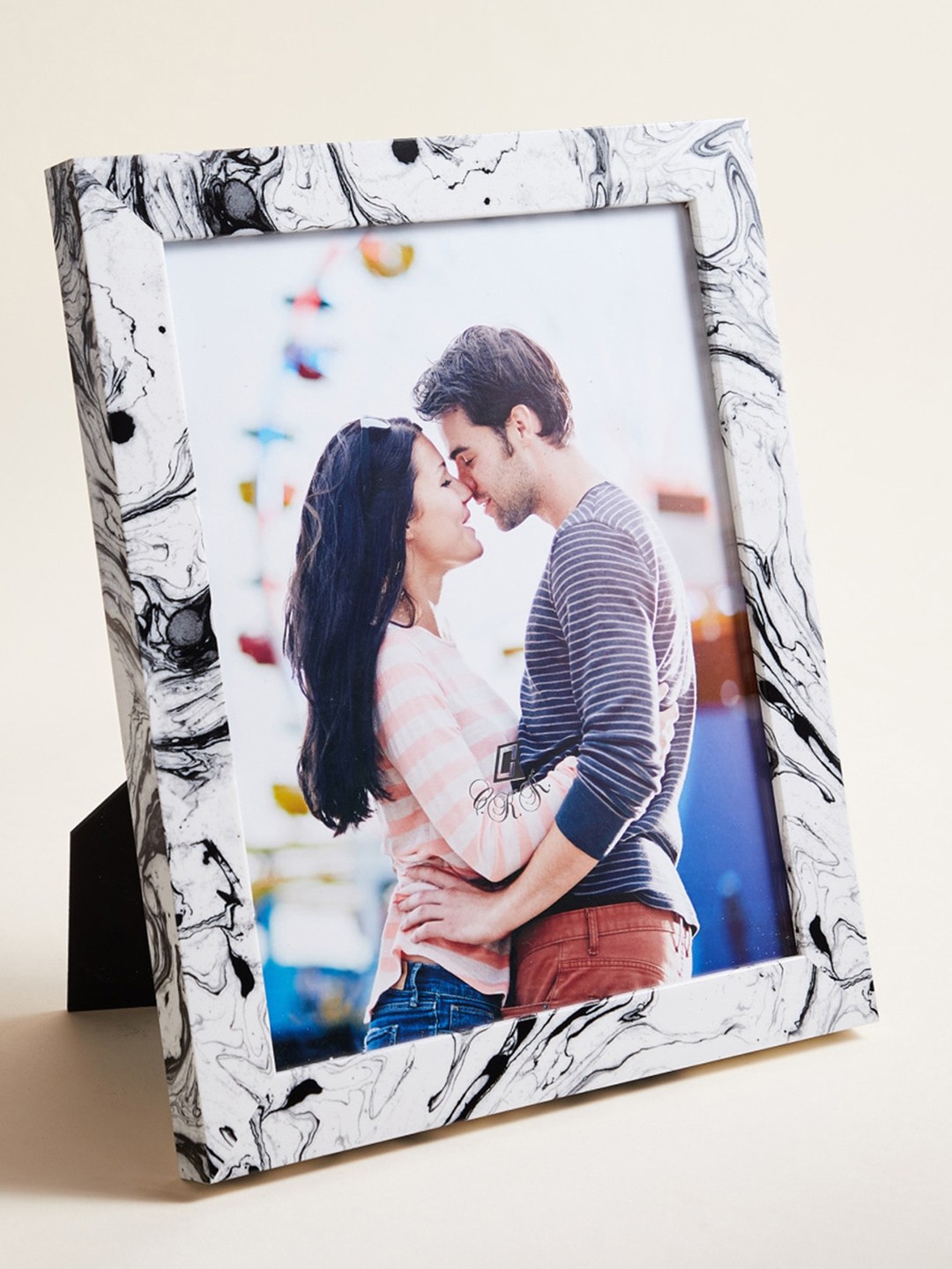 

Home Centre White & Black Printed Marble Finish Rectangular Photo Frame