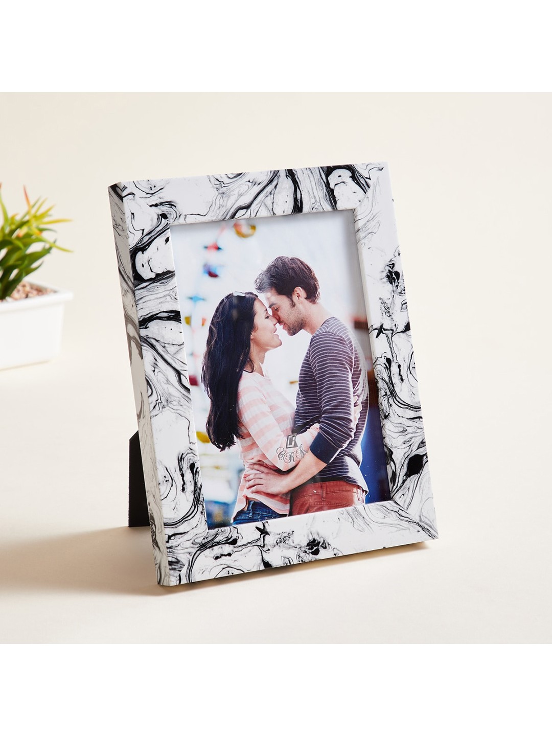 

Home Centre Marble Finish Plastic Photo Frame, Multi
